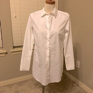 NY&C size small white button front tunic with button detail on slides.